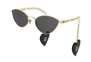 Солнцезащитные очки Gucci GG0977S 001